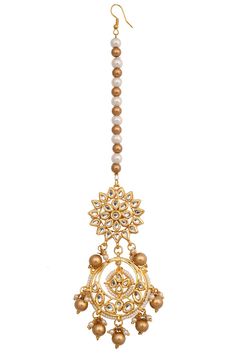 Add this mang tika s to your jewellery collection and shine at the next ethnic event. Embellished with beads, it is truly a stunning piece to flaunt this season. Product Features: Color: Gold Tone Kundan Handcrafted Maang Tikka Material: Metal copper alloy, Synthetic Pearls/beads work : kundan with meenkari on back side Dimension: Length-7in Width- 1.5 in Pack Of: mang tika Occasion: festive and wedding Disclaimer: There will be slight difference in digital to actual image Festive Tikka With Latkans For Eid, Temple Jewelry Tikka With Latkans For Eid, Bollywood Style Tikka For Navratri Festive, Bollywood Style Tikka For Navratri, Festive Bollywood Tikka With Latkans, Festive Tilla Tikka For Diwali, Kundan Chandbali Tikka With Motifs, Kundan Tikka For Festive Diwali, Kundan Tikka For Diwali Festive Occasions