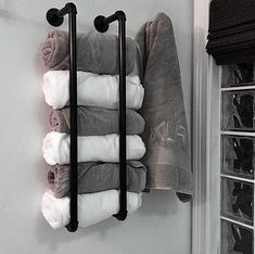 a towel rack is hanging on the wall