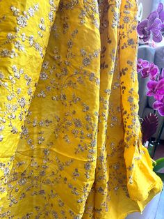 "Yellow Embroidered Banarasi Silk Fabric with Sequins Width: 36\" Banarasi Silk is a fine variant of Silk originating from the city of Varanasi in Uttar Pradesh, India. Banarasi silk have its roots seeped into the rich cultural history of India. Slight difference in color from visible product image is possible The Width of the fabric is 42 inches, Embroidery done on 36 inches of Fabric Suggested Care: Dry Cleaning is preferable. generally silk fabrics should be dry cleaned. In hand washing, the Designer Palazzo, Suit Dupatta, Dupatta Dress, Suit Indian, Stylish Mirror, Suit Embroidery, Peach Colour, Palazzo Suit, History Of India