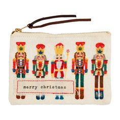 a small zipper bag with nutcrackers and merry christmas written on the front