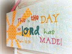 this is the day the lord has made with crayon paper and colored thread