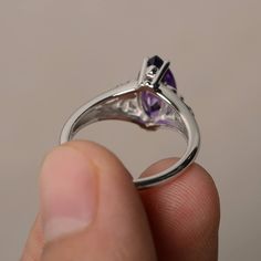 This is a gorgeous handmade creation. Its beauty is its simplicity & Elegance. The 6*12 mm marquise shape faceted natural amethyst is crafted in solid sterling silver and with rhodium plated. Main stone weight about 1.67 ct. All item is sent in a beautiful gift box If you have any idea of design your ring,pls contact me directly. You can realize more lovely stuff clicking the link https://www.etsy.com/shop/knightjewelry?refshopsection_shophome_leftnav Please leave the correct address and you Marquise Amethyst Ring Gemstone Gift, Marquise Amethyst Ring Gift, Marquise Amethyst Ring As Gift, Fine Jewelry Marquise Rings As Gift, Fine Jewelry Marquise Rings For Gift, Sterling Silver Marquise Cut Ring With Prong Setting, Marquise Sterling Silver Promise Rings, Marquise Cubic Zirconia Gemstone Ring, Gift Marquise Amethyst Ring