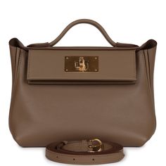 This 24/24 bag is in Etoupe evercolor and swift leather with gold hardware, has tonal stitching, front turnlock closure, open rear pocket, single flap top handle and removable shoulder strap.The interior is lined with Etoupe swift leather and has one zip pocket with an Hermes engraved pull on the back wall.Collection: BOrigin: FranceCondition: New and never worn (plastic on hardware)Accompanied by: Hermes box, Hermes dustbag, shoulder strap, shoulder strap dustbag, felt, ribbon and carebookMeasu Damier Azur Speedy, Neverfull Mm Monogram, Hermes Box, Lv Bags, Louis Vuitton Damier Azur, Louis Vuitton Damier Ebene, Hermes Bags, Luxury Handbags, Belt Buckles