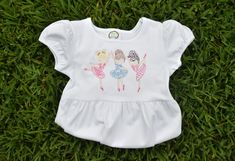 This item features three adorable sketch embroidered ballerinas. This is perfect for a little one who loves to dance! Shirts and dresses can be personalized by adding a name below the ballerina design. If you would like a name added to your order please list it in the personalization section. Embroidery design and name size may vary depending on the size shirt or dress ordered.  All shirts and dresses are made from 6+ oz 100% combed cotton interlock cotton. Items are safe to machine wash and dry Spring Tops With Custom Embroidery, Cute Fitted Tops With Custom Embroidery, Cute Fitted Top With Custom Embroidery, Fitted Playful Tops For Play, Embroidered Ballerina, Ballerina Design, The Ballerina, Dance Shirts, Dress Order