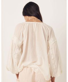 Elegant and sweet, our Magnolia Blouse features intricate details of micro ruffles, lace trims and tassels all crafted on the softest organic cotton. Pair this back with your favourite denim or dress it up with a statement skirt and jewels to take this baby from day to night. Crafted from our preferred fibre 100% organic cotton Shell buttons down front allowing it to be worn as a blouse or open as a shirt Unlined for easy wear 100% Organic Cotton Elasticated Sleeve Cuff Neck Ties Raglan Sleeve P Statement Skirt, Lace Trims, High Waist Bottoms, Feminine Dress, To Night, Antique White, Easy Wear, Lace Detail, Off Shoulder Blouse