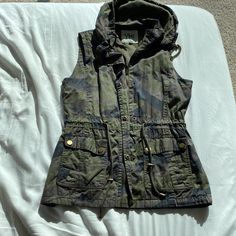 Never Worn- In Great Condition. Military Vest For Outdoor Activities In Fall, Military Vest For Fall Outdoor Activities, Utility Outerwear For Hiking In Spring, Spring Utility Outerwear For Hiking, Utility Outerwear For Spring Hiking, Fall Camouflage Outerwear For Hiking, Khaki Hiking Vest For Fall, Khaki Vest For Hiking In Fall, Military Style Outdoor Vest For Fall