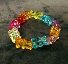 a multicolored bracelet sitting on top of a table