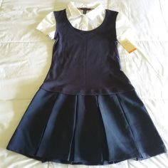 Brand New With Tags Size: Girls 14 Color: Navy, White Pull On. Layered Look Dress. Knit Vest, Blouse Inserts, Pleated Skirt Bottom In One Spring Sleeveless School Uniform Dresses, Casual Mini Dress For School In Spring, Black Sleeveless School Dress, Fitted Casual Dress For School, Casual Navy Dress For School, Casual Mini Dress For School, Preppy Fitted Dresses For School, Vest Blouse, Dress Knit