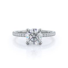 a round cut diamond ring with pave set shoulders