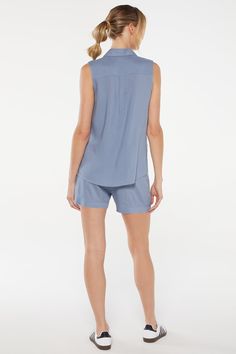 Feel the breeze in this lightweight, three-piece set, featuring a collared tank top with a button-up front, matching chambray shorts with a comfort waistband, and a seamless bra with a sweetheart neckline. Summer Vacation Sleepwear With Built-in Shorts, Spring Sleepwear With Built-in Shorts, Chic V-neck Summer Sleepwear, Sleeveless Cotton Short Set For Spring, Chic Short Sleepwear For Loungewear, Chic Summer Sleepwear With Relaxed Fit, Chic Relaxed Fit Summer Sleepwear, Spring Collared Loungewear Bottoms, Casual Sleeveless Short Set For Spring