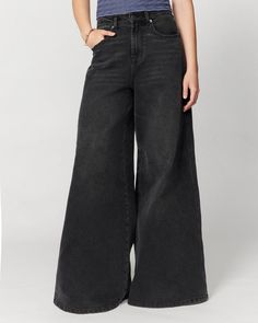 Embrace your soft side in our wide leg jeans, designed for the sweatpant lover. They hug you comfortably at the waist and then flare out like a 70's dream. Peep the special little front pocket made for your fave lip gloss. Trendy Washed Black Wide Leg Jeans, Relaxed Fit Wide Leg Flare Jeans For Streetwear, Washed Black Wide Leg Flare Jeans For Streetwear, Trendy Washed Full-length Flare Jeans, Trendy Washed Flare Jeans Full Length, Wide Leg Flare Jeans In Washed Black For Streetwear, Wide Leg Washed Black Flare Jeans For Streetwear, Trendy Washed Full Length Flare Jeans, Trendy Washed Black Relaxed Fit Flare Jeans