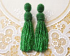 Long Green beaded tassel earrings Short Clip beaded earrings Oscar de la Renta earrings Seed bead Green earrings Statement Celebrity jewelry Statement earrings celebrity jewelry Emerald accessory Elegant and beautiful long beaded tassel stud earrings - new brand in fashion jewelry 2016. These earrings made of Czech beads . This collection was inspired by designer Oscar De La Renta. These earrings are perfect for the creation of evening and daily image. They are very light weight. By your order, earrings can be made other colors and lengths. Please, write about it in the personal massage. Please note that due to lighting effects, monitor's brightness, contrast and other parameters of the photo may be slight differences in the colors on this product. The order is sent in a beautiful gift box Ombre Earrings, Short Clip, Celebrity Jewelry, Beaded Tassel Earrings, Green Earrings, Elegant Accessories, Earrings Statement, Czech Beads, Beaded Tassels