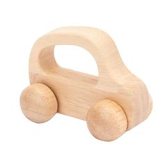 a wooden toy car sitting on top of a white surface