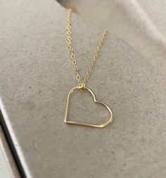 Simple Gold Necklaces For Valentine's Day, Delicate 14k Gold Open Heart Charm Necklace, Delicate 14k Gold Heart Necklace With Adjustable Chain, Everyday 14k Gold Open Heart Charm Necklace, Simple Gold Heart Jewelry, Simple Gold Heart-shaped Jewelry, Minimalist 14k Gold Filled Heart Pendant Necklace, Minimalist Gold Heart Necklace For Mom, Minimalist 14k Gold Filled Open Heart Jewelry