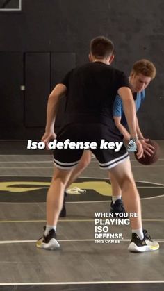 two young men are playing basketball on an indoor court with the caption, so defense key when you're playing defense