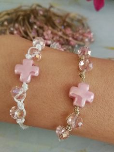 Ceramic cross and crystal bracelets baptism favors Handmade  Christening or wedding guests gifts Quantity option available  Baby girl boy baptismal DESCRIPTION Handmade martirika guests gifts favors with ceramic cross and crystal beads   Come each piece in gift pouch Quantity option available ♥ More options here : https://www.etsy.com/shop/eAGAPIcom?ref=seller-platform-mcnav§ion_id=16348716 ♥ OPTIONS after contact Personalize Add initials charms,meaning or symbol charms Order twins design Change Handmade Adjustable Rosary Bracelet For Weddings, Adjustable Cross Jewelry For Wedding, Adjustable Cross Bracelets For Wedding, Adjustable Cross Bracelets For Weddings, Handmade Silver Jewelry For Baptism, Adjustable Cross Rosary Bracelet For First Communion, Adjustable Cross Bracelets For Baptism, Spiritual Cross Rosary Bracelet For Baptism, Spiritual Cross Bracelets For Baptism