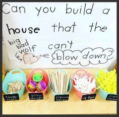 an assortment of food items displayed in front of a sign that says can you build a house that the big kid can't grow down?