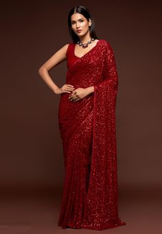 Red georgette saree with blouse 1010  Desc:  Color : Red Fabric : Georgette Work : Sequins   Thread Wash Care : Dry clean Sleeve Style : Sleeveless Long Sleeves : Done only in Custom Stitch Sleeves Lining : Done only in Custom Stitch Bust Size : 32 to 42 Inches Occasion : Sangeet   Party Wear   Engagement   Reception   Ceremonial   Baby Shower. With Express Free Shipping and Custom Stitching, Buy Indian Wedding Party Wear Saree Red georgette saree with blouse 1010 online in USA, UK and Canada fr Sequins Saree, Red Sari, Party Wear Sarees Online, Sequence Saree, Sequin Saree, Party Sarees, Party Wear Saree, Saree Design, Georgette Blouse