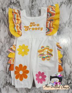 Two groovy birthday romper comes with snap back buttons on center neck.  Available in 18 months to 3T . Personalization can be added at extra cost.  If item is needed for a specific date please contact shop prior to ordering for availability. Fitted Fun Bubble Romper For Spring, Spring Fitted Fun Bubble Romper, Playful White Jumpsuits And Rompers With Ruffles, Playful White Jumpsuit With Ruffles, Retro Jumpsuits And Rompers With Retro Print For Summer, Playful Multicolor Bubble Romper For Spring, Cute Multicolor Bubble Romper For Spring, Spring Multicolor Bubble Romper With Ruffles, Spring Multicolor Ruffled Bubble Romper