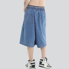 Take your look to the next level this summer with our retro baggy men's denim shorts from the 2023 Collection. Combining the timeless trend of denim with the couture trend of y2k fashion. these shorts will become your go-to piece for any occasion. Featuring a medium-rise fit. zipper and button closures. and a variety of colors. these shorts are the perfect blend of comfort and vibe.Distinctive Features: Y2K Style: Inspired by the latest Y2k trendy trends. these shorts are a stylish vogue stateme Cotton Jean Shorts With Built-in Shorts For Streetwear, Casual Jeans With Built-in Shorts For Streetwear, Y2k Style Short Summer Jeans, Y2k Style Short Jeans For Summer, Y2k Baggy Summer Shorts, Y2k Style Baggy Shorts For Summer, Y2k Short Jeans For Streetwear, Baggy Y2k Denim Shorts, Hip Hop Style Jeans For Summer Streetwear