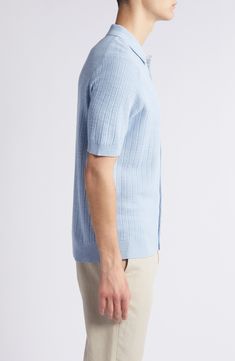 Crafted with subtle ribbing, this sweater-knit button-up pairs the softness of cotton with the smartness of a classic rolled collar. 26 1/2" length (size Medium) Spread collar Short sleeves 55% cotton, 45% acrylic Machine wash, dry flat Imported Fitted Polo Collar Top With Button Cuffs, Button-up Textured Knit Tops For Workwear, Textured Knit Button-up Tops For Work, Classic Spring Polo Sweater For Work, Collared Polo Sweater For Spring Business Casual, Classic Spring Workwear Polo Sweater, Blue Textured Knit Collared Tops, Button-up Polo Sweater With Ribbed Collar For Work, Button-up Polo Sweater For Work With Ribbed Collar