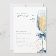 a new year's eve party card with a champagne glass and bow on it