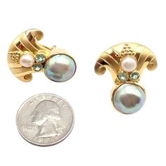 About This Piece: These rare vintage Paula Crevoshay earrings are one-of-a-kind (OOAK) pieces crafted in 18k gold. Featuring abalone, pearls, and blue gemstones, they showcase Crevoshay's exceptional artistry and meticulous craftsmanship. Elegant and distinctive, these earrings add a unique touch of luxury to any fine jewelry collection. Metal: 18k Yellow Gold Measurements: 25.5mm x 30mm Weight: 22.8 grams Stones: 2x Abalone Pearls: 13.5mm 2x White Pearls: 6mm 4x Blue Gemstones (Aquamarines?): 3 Chanel Ring, Blue Gemstone Earrings, Watch Cufflinks, Hermes Jewelry, Fine Jewelry Collection, Cartier Ring, Blue Gemstones, Gemstone Earrings, Pearl White