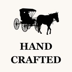 a horse drawn carriage with the words hand crafted on it