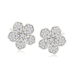 Ross-Simons - Italian .80 ct. t. w. Cubic Zirconia Flower Earrings in Sterling Silver. Crafted in Italy in polished sterling silver, these adorable flower earrings are dazzled by .80 ct. t. w. round brilliant-cut CZs. We suggest pairing with simple hoops for a chic stacked look! Post/clutch, CZ flower earrings. CZ weights are diamond equivalents. Classic Silver Diamond Flower-shaped Earrings, Classic Silver Flower Shaped Diamond Earrings, White Flower-shaped Cubic Zirconia Diamond Earrings, Silver Diamond Flower Shaped Earrings, Silver Diamond Earrings In Flower Shape, Classic Cubic Zirconia Flower Earrings, Silver Flower-shaped Earrings With Brilliant Cut, Silver Flower-shaped Earrings With Diamond Accents, Silver Flower Diamond Earrings With Prong Setting