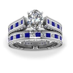 a diamond and blue sapphire wedding ring set