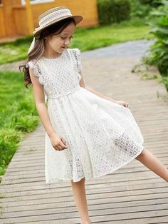 A pretty lace dress for a young little girl. Fresh and airy, this floral lace dress features a twirly fit-and-flare silhouette and V-back gives the sense of feminity and pretty. It has a detailed lace design that makes it look elegant even in its simple style. It is a perfect dress for any casual or special occasion. Influencer@@iamselena16 Influencer@_its_sophie_1 Material: COTTON Collar: Crew Neck Sleeve Style: Petal Sleeve Decoration: Lace Pattern Type: Solid Summer Lace Dress With Lace Bodice For Dress-up, Spring Lace Dress With Lace Bodice For Dress-up, Summer A-line Lace Dress With Lace Bodice, Summer Lace Dress With Lace Bodice, Summer Formal Lace Dress With Lace Bodice, Scalloped Lace Dress For Dress-up Events, White Summer Twirl Dress With Flutter Sleeve, White Flutter Sleeve Twirl Dress For Summer, Spring Lace Dress With Lace Trim For Dress-up