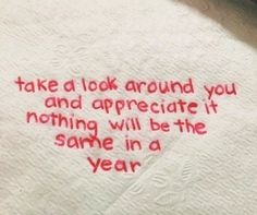 an embroidered napkin with the words take a look around you and appreciate it nothing will be the same in a year