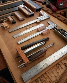 many different types of woodworking tools on a table