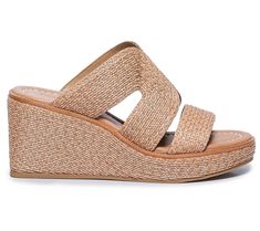 Enjoy easygoing and effortless style the moment you slip on these sophisticated sandals featuring woven raffia straps and sturdy wedge heels. From Bernardo. Straw Slip-on Wedge Sandals, Straw Slip-on Wedge Sandals For Vacation, Vacation Straw Wedge Slip-on Sandals, Elegant Wedge Heel Mules For Beach, Comfortable Straw Wedge Heel Sandals, Straw Wedge Heel Sandals, Comfortable Wedge Sandals With Woven Sole For Vacation, Natural Sandals With Woven Sole And Wedge Heel, Casual Woven Leather Wedge Sandals