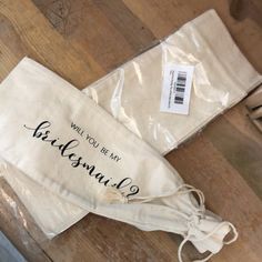 two bags with the words will you be my bridesmaid written on them