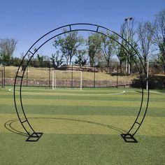 a soccer field with a goal in the middle