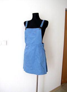 dress with suspenders, blue color, size 38, skirt length from the waist 44 cm/ 17,5' waist 34-36 cm x 2 / 13,5-14' , rubberized material with the addition of elastin hips 49 cm x 2 /19' 97% cotton, 3% elastin Blue Overalls With Adjustable Straps For Spring, Spring Blue Overalls With Adjustable Straps, Casual Blue Suspender Dress With Adjustable Straps, Blue Cotton Pinafore Dress With Pockets, Fitted Cotton Pinafore Dress For Work, Fitted Blue Pinafore Dress For Spring, Sleeveless Blue Cotton Overalls, Blue Fitted Sleeveless Pinafore Dress, Cotton Knee-length Pinafore Dress With Pockets