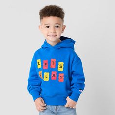 Part of the JCPenney x HARIBO limited-time collection, your toddler will be dressed and ready for fun adventures with this boy's graphic hoodie. Made from soft cotton-fleece, this pullover sweatshirt has drop shoulders and long sleeves with the brand's logo at the cuff.Features: HoodedClosure Type: Pullover HeadFit: Classic FitNeckline: Hooded NeckSleeve Length: Long SleeveSleeve Style: Fitted SleeveApparel Length: 17.5 Inches - Back, 16.75 Inches - FrontFiber Content: 60% Cotton, 40% Polyester… Playful Winter Hoodie, Playful Blue Winter Sweatshirt, Playful Blue Hoodie With Long Sleeves, Playful Blue Long Sleeve Hoodie, Blue Long Sleeve Playful Hoodie, Blue Cotton Hoodie For Playtime, Playful Cotton Hoodie For Playtime, Playful Cotton Sweatshirt For Playtime, Playful Winter Sweatshirt For Playwear