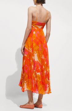 Subtle crinkles in the fabric bring chill energy to this flowy sundress. Slips on over head V-neck Lined 100% polyester Machine wash, line dry Made in Turkey Vacation V-neck Pleated Midi Dress, Flowy V-neck Midi Dress For Beach, V-neck Pleated Midi Dress For Vacation, Pleated V-neck Midi Dress For Vacation, Beach V-neck Pleated Dress, Summer Midi Dress With Flowy Skirt And V-neck, Beach V-neck Flowy Midi Dress, Summer Beach Pleated Maxi Dress, Beach V-neck Midi Dress With Flowy Skirt