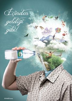 a man holding a water bottle in front of his face with birds flying around him