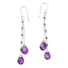 Like glistening dewdrops 14 carats of purple amethyst are used to create this pair of dangle earrings from Bali. Ketut Sulastri creates these earrings which are crafted with petite chain and links of sterling silver. Purple Sterling Silver Teardrop Dangle Earrings, Purple Sterling Silver Teardrop Earrings, Purple Long Drop Jewelry With Ear Wire, Purple Amethyst Drop Teardrop Earrings, Purple Drop Chandelier Earrings As Gift, Amethyst Long Drop Earrings For Pierced Ears, Purple Amethyst Teardrop Earrings, Purple Long Drop Earrings With Ear Wire, Nickel-free Purple Dangle Chandelier Earrings