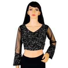 Item Description Beautiful Women's Velvet Sequins V-Neck Net Sleeves Ethnic Designer Blouse Fabric:-Velvet Sequins Color:-Black Sale For:-1 Blouse Closure Type:-Back Hook & Eye With Dori Sleeves Type:-3/4 Sleeves Neck Style:-V-Neck Product:-Padded Blouse With Cotton Inner Lining Care Instructions:-Hand Wash or Dry Clean Only Disclaimer:-The Actual Color Of The Product Slightly Vary From The Image Due To Photographic Light Or Monitor's Display. Measurement Sleeves Length:-21.5 Inch Front Neck Depth :-8 Inch Back Neck Depth :-11.5 Inch Ethnic Sequins Work Velvet Designer Blouse Net Sleeves To Give Yourself A Splendid Traditional Makeover! A Perfect Match For Your Grand Sarees.Pair This Blouse With Any Type Of Saree In Various Occasions. This Would Be Classy Yet Fashionable Choice For Wedding Festive V-neck Georgette Blouse Piece, V-neck Blouse Piece For Diwali Reception, Festive V-neck Choli With Mirror Work, Eid Georgette Blouse With Mirror Work, Fitted Long Sleeve Pre-draped Saree For Eid, Traditional V-neck Sharara For Party, Reception Party Wear Blouse With Pallu, Semi-stitched Party Wear Blouse For Reception, Traditional V-neck Party Sets