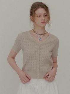 This is a modern and feminine cardigan by PLAC that is made out of high quality and sturdy fabric. With unique design detail and trendy mood, you can style it for your casual and young daily outfit.- Slim silhouette with short sleeves- Punched detail on the fabric- High air permeability suitable for summer Fitted Beige Cardigan With Short Sleeves, Beige Short Sleeve Cardigan For Spring, Chic Short Sleeve Cardigan For Fall, Casual Beige Short Sleeve Cardigan, Classic Beige Summer Cardigan, Elegant Short Sleeve Fall Cardigan, Chic Short Sleeve Cardigan For Spring, Classic Short Sleeve Cardigan For Spring, Elegant Beige Cardigan For Day Out