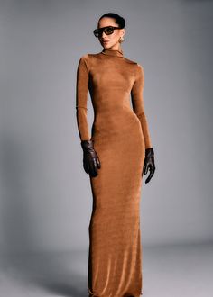 Long sleeve, high neck maxi dress. Shown here in Camel. 94% Polyester, 6% Spandex Made in China Model is 5'10" wearing size S Style No. 4467-17 2024 Wardrobe, Fall Wardrobe Staples, High Neck Maxi Dress, Summer Neutrals, Knit Outerwear, Knit Shoes, Romper And Jacket, Knit Denim, Summer Capsule Wardrobe