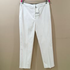 Brand : Zara Size : Xxl Waist 34” Hip 42” Hi Rise 12” Length 39”Inseam 27” Color : White Material : Polyester Cotton Elastane Condition : New Pockets Tailored Waistband Rustic Zipper 1801/247 1478/544 Tag Classic City Spring Summer Fall Workwear Career Business Teacher Colorful Homecoming Modern Corpcore Office Professional Professor Elegant Timeless Classy Old Money Luxury Slim Fit High-waisted Summer Pants, Slim Fit Straight Pants For Spring, Chic Slim Fit Bottoms For Summer, Spring High Waist Slim Fit Pants, White Slim Fit Trousers, White Slim Fit Straight Pants, Elegant White Slim Fit Bottoms, White Slim Fit Bottoms With Pockets, High Waist Slim Fit Cotton Pants