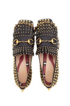 2018 Gucci Black and Gold Studded Polly Leather Heeled Loafer. This item is in good condition.Size: 38Heel: 2.25" Brand = Gucci Shoe Size = 38 Color = Black and Gold Condition = Good Item Number: 21780-644 Item ID: 182738 Category: Loafers Gucci Heeled Loafers, Gucci Shoe, Gold Loafers, Gucci Heels, Black Loafers, Timeless Handbag, Gucci Black, Heeled Loafers, Luxe Fashion