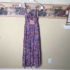 Abel The Label Sz S Lilac Dream Purple Smocked Floral Ruffled Maxi Dress Flowy Multicolor Smock Maxi Dress For Spring, Purple Midi Length Sundress For Vacation, Purple Brunch Dress With Smocked Back, Purple Dress With Smocked Back For Brunch, Purple Midi Dress With Smocked Bodice, Casual Printed Purple Maxi Dress, Casual Purple Printed Maxi Dress, Casual Purple Floral Print Maxi Dress, Purple Tiered Dress With Floral Print