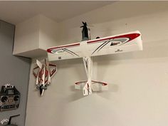 a model airplane hanging on the wall