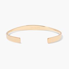 Declare your bold style with the Whitney Cuff Bracelet. Crafted of warm gold, its sleek silhouette is personalized with an engraved name of your choice. Show the world who you are in a luxurious way you can feel proud of. Will it be yours? Available in 14k gold plated brass Width: 1/4" Length: 6" With engraving this item is FINAL SALE SKU: BYB1108 Adjustable Classic Rose Gold Bracelet, Classic Adjustable Rose Gold Bracelet, Classic Cuff Bracelets With Polished Finish, Sleek Adjustable Jewelry With Polished Finish, Classic Adjustable Rose Gold Cuff Bracelet, Adjustable Polished Rose Gold Bangle, Adjustable Rose Gold Bangle With Polished Finish, Modern Adjustable Cuff Bracelet With Shiny Finish, Classic Rose Gold Cuff Bracelet For Everyday