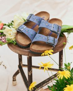 The Arizona is one of our perennial favorites of BIRKENSTOCK. Customized by us, here in the USA, using a special western-inspired debossing and tooling technique, then hand painted directly onto the shoe by local artisans, these classic comforts look and feel better with age, and are meant to be worn with GREAT abandon. Note this style is narrow-width and has a SOFT FOOTBED. Materials: Classic oiled leather upper, Contoured cork Footbed, Suede footbed lining, EVA Outsole. Two adjustable straps with metal pin buckles. Made in Germany/ Hand Painted in the USA by The Great.   Paint is specially made for leather and will not wash off easily in water. Wipe clean with a damp cloth to remove dirt. Read more about Care Tips for your BIRKENSTOCK HERE. Please note as with this time-honored hand pain Boston Birkenstock, Arizona Birkenstock, Emily And Meritt, Birkenstock Arizona, Metal Pins, Dusty Blue, Feel Better, Birkenstock, Arizona